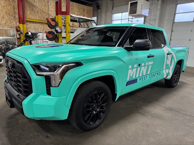Teal commercial fleet wrap on Toyota Tundra — Blue Rose Wraps Springfield OR