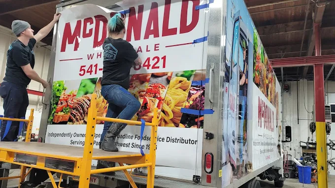Large commercial trailer wrap installation — Blue Rose Wraps Eugene OR